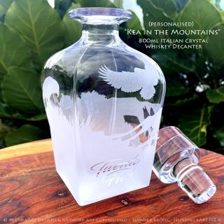 Kea in the Mountains NZ alpine parrot custom engraved glass whisky bottle by Summer Brook